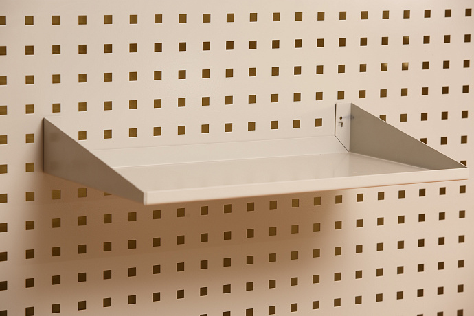 A4 perforated panel shelf